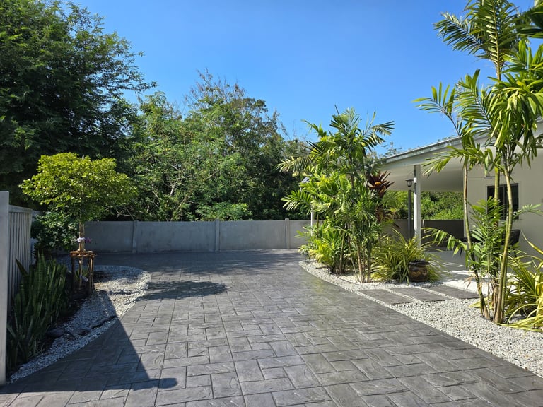 Stunning stamped concrete driveway with intricate designs in Thailand