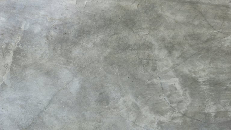 Polished texture, old grey cement wall with stains, building wall texture