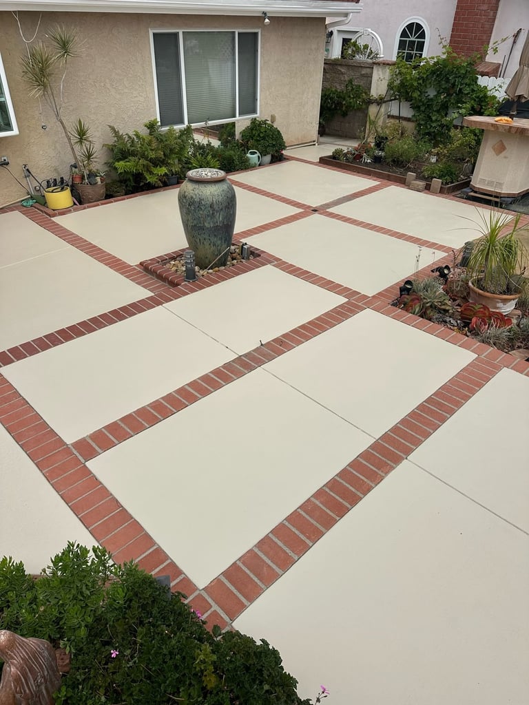 Acrylic sealed patio with brick borders, overhead view